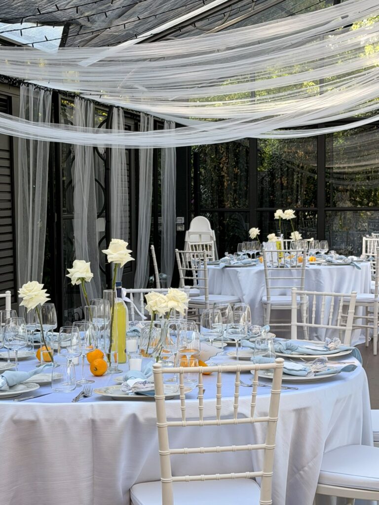 Lake Maggiore wedding table styling with white roses lemons and candlelight at Villa Muggia
